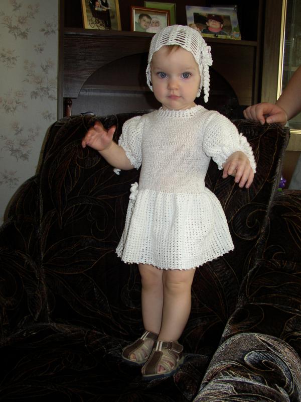 white dress with flowers and cloche