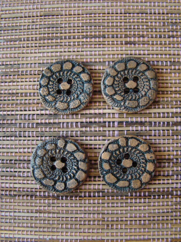 Aged clay buttons