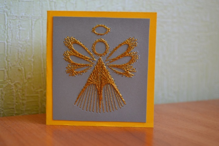 A card with angel