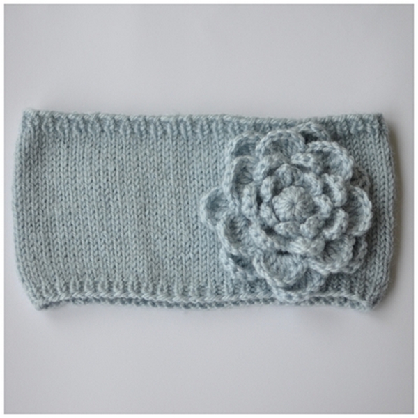 Light blue headband with a flower