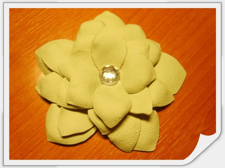 White leather brooch