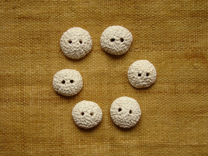 White molded buttons