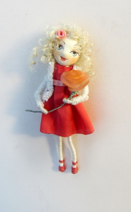 Brooch doll