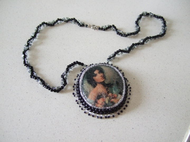 pendant with lady