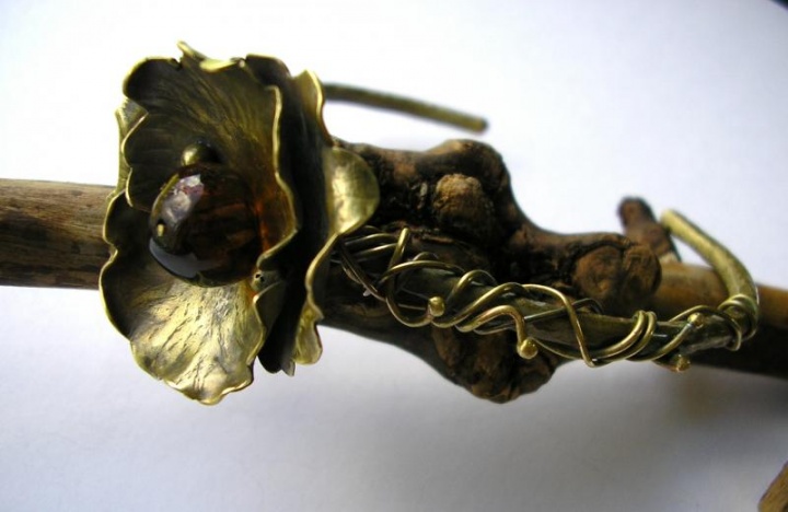 bronzed bracelet with flower