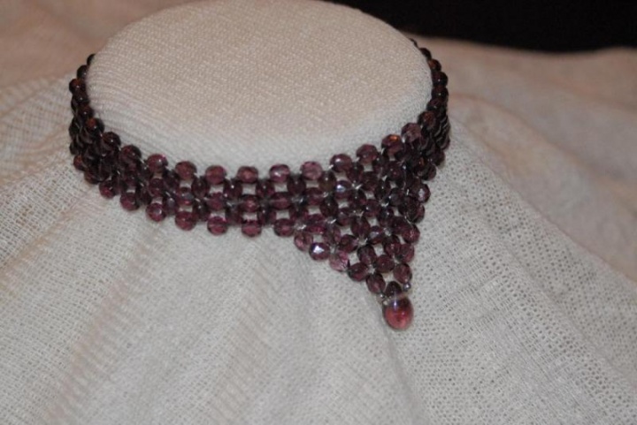 necklace of beads with glass