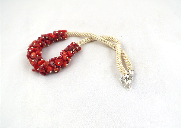 Beige bead crochet necklace with red coral stone