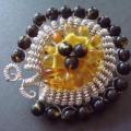 The interpretation of the sun - Brooches - beadwork